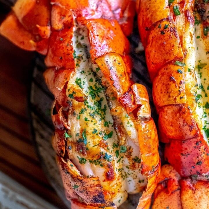 picture of grilled lobster tails on a cutting board