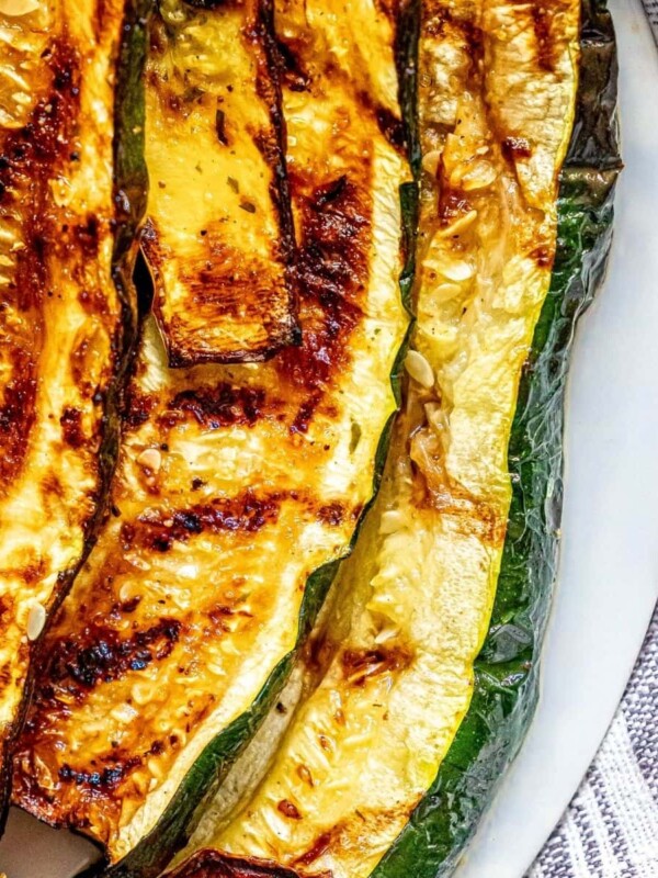 picture of grilled zucchini and squash on a white plate