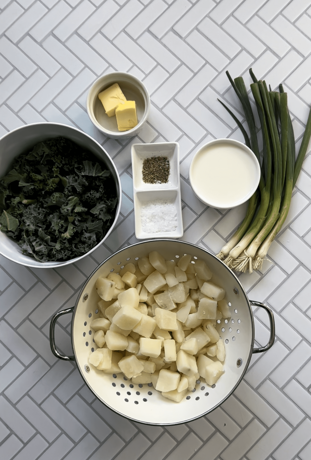 picture of potatoes milk and seasonings on a table