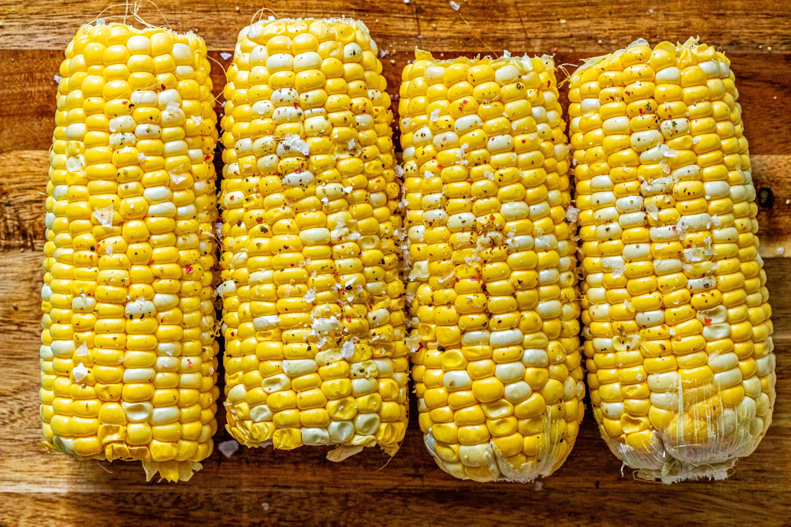 picture of corn on the cob with pepper