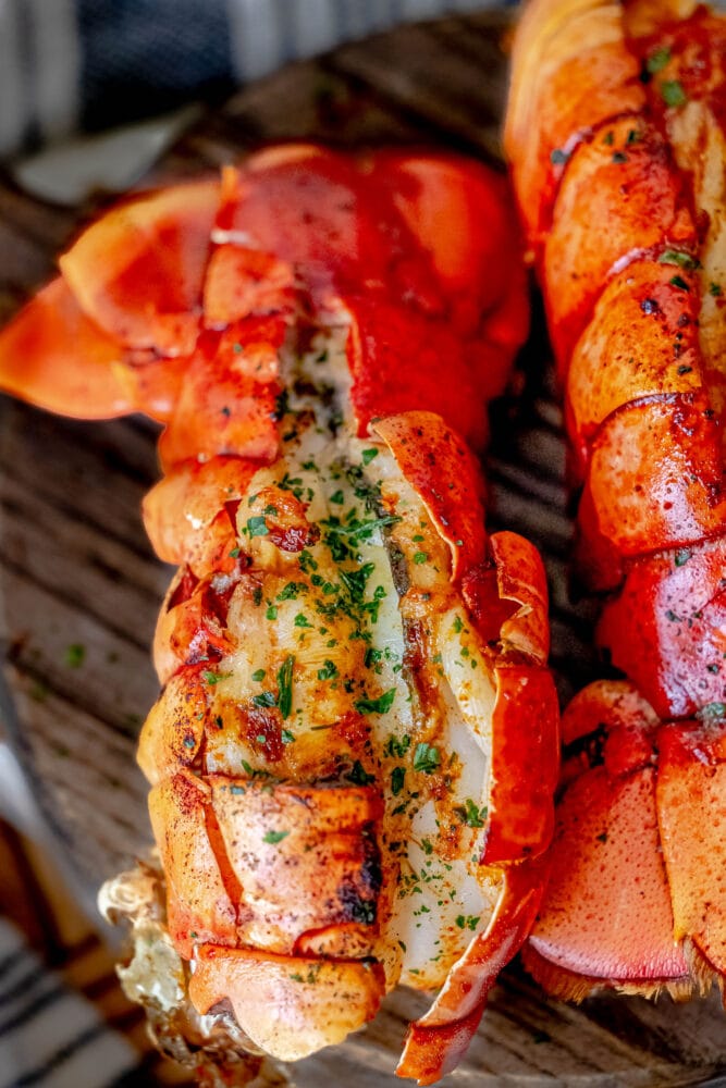 picture of grilled lobster tail on a cutting board