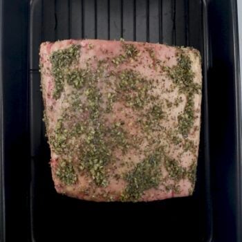 seasoned ribeye roast on roast pan