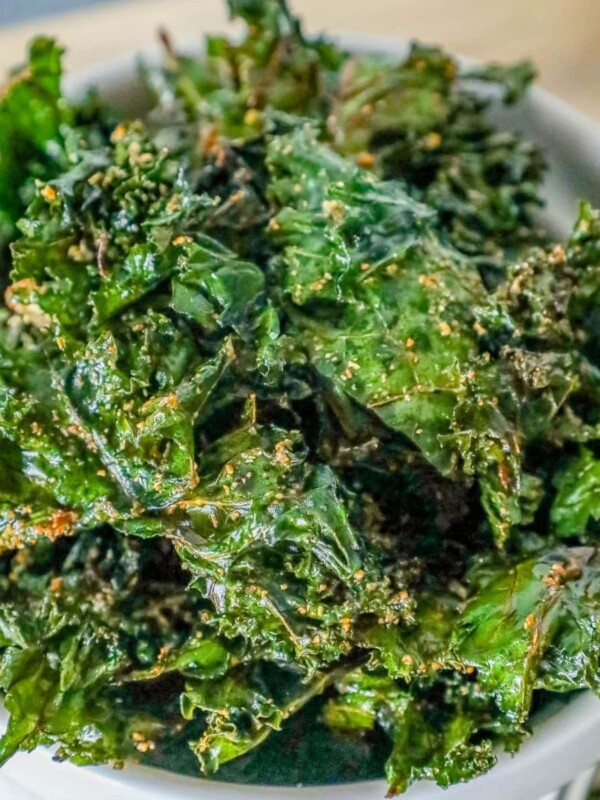 picture of baked kale chips in a white bowl