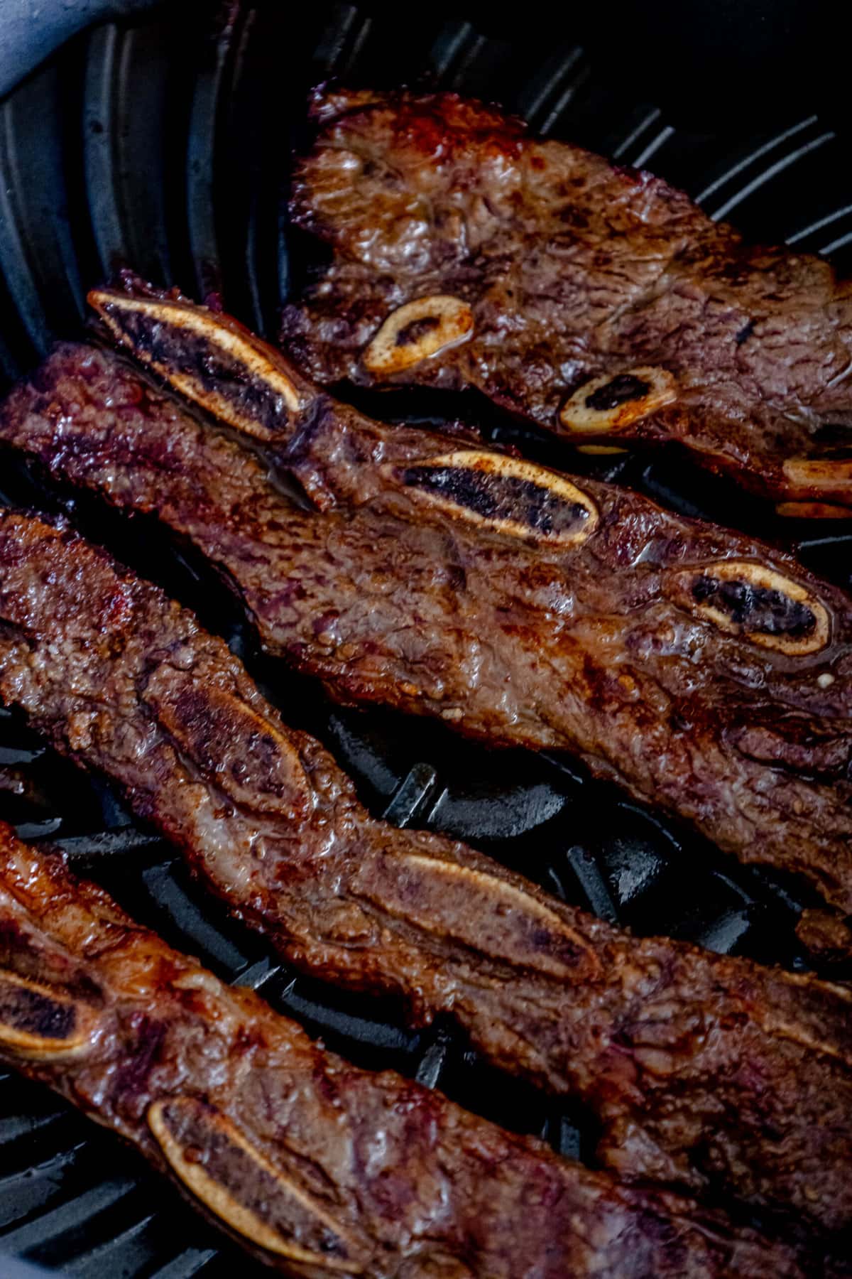 picture of flanken ribs on a grill