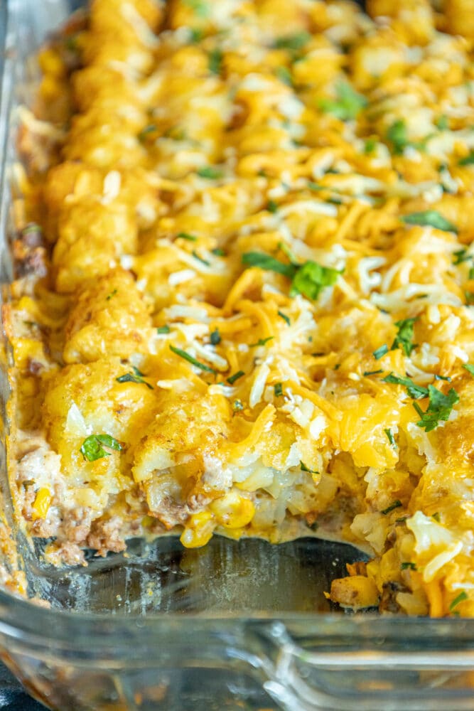 picture of tater tot cowboy casserole in a glass baking dish