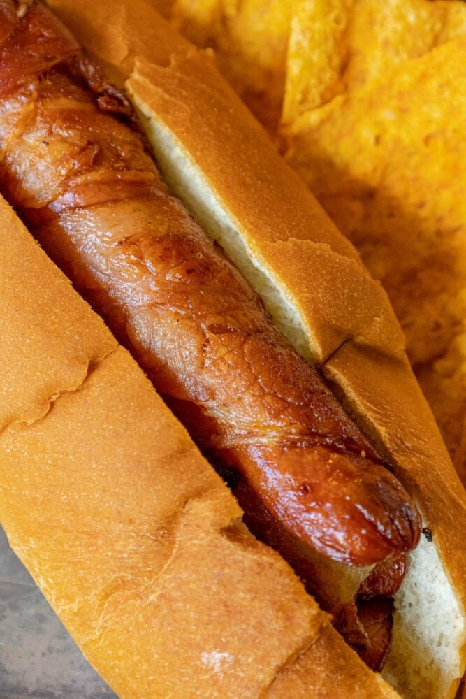 picture of bacon-wrapped hot dog in a bun