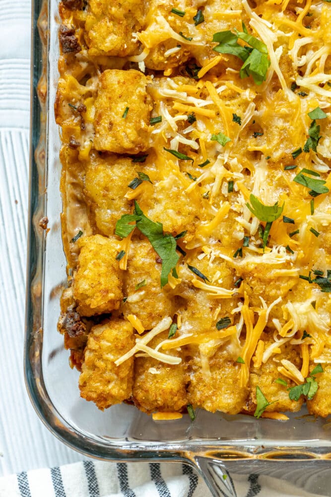 picture of tater tot cowboy casserole in a glass baking dish