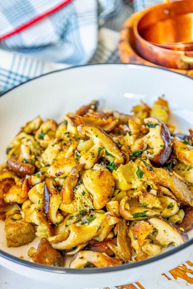 picture of sauteed mushrooms in a white bowl