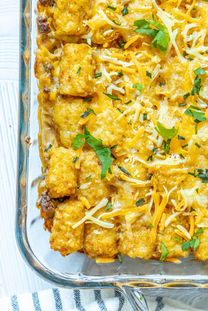 picture of tater tot cowboy casserole in a glass baking dish