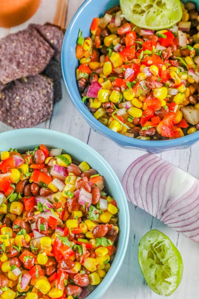 https://sweetcsdesigns.com/wp-content/uploads/2022/07/Black-bean-and-corn-salsa-recipe-picture1-667x1000.jpg