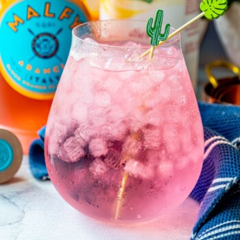 picture of pink gin and tonic on a table
