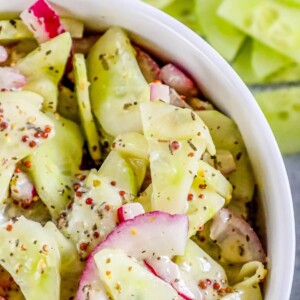 picture of creamy cucumber salad with mustard and mayonnaise in a bowl