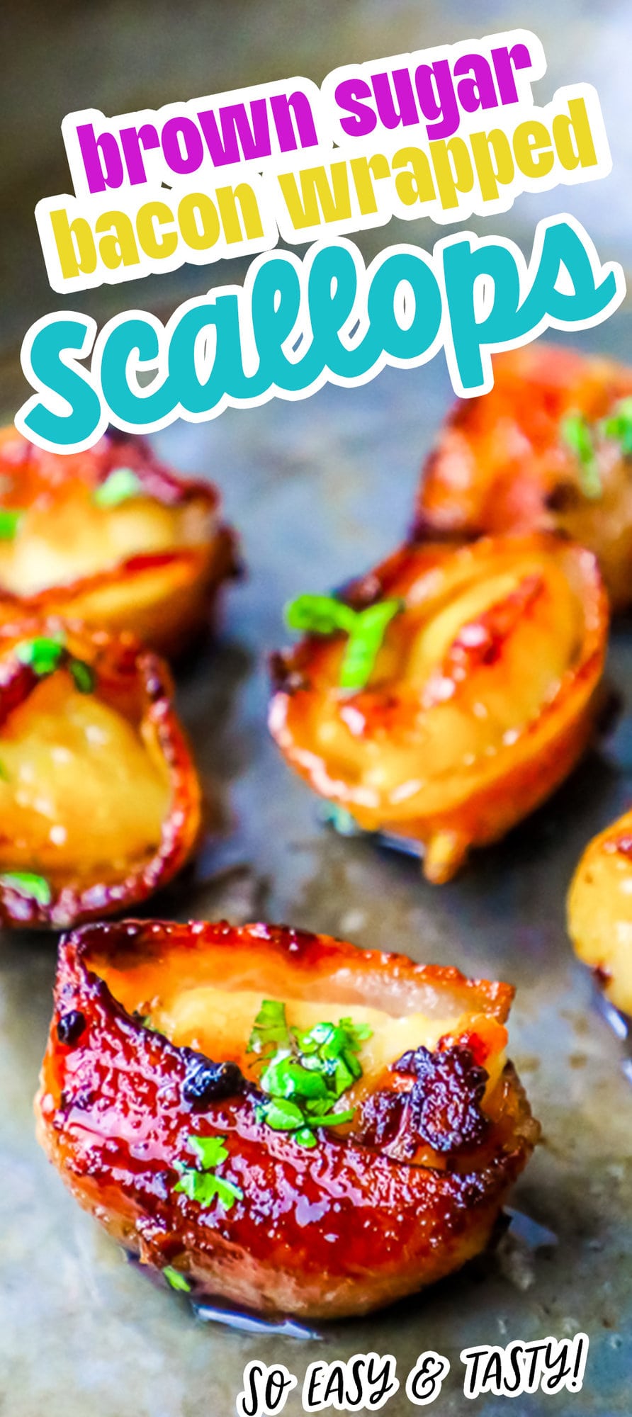 picture of bacon wrapped scallops with a brown sugar glaze on a white plate with chopped parsley on top 