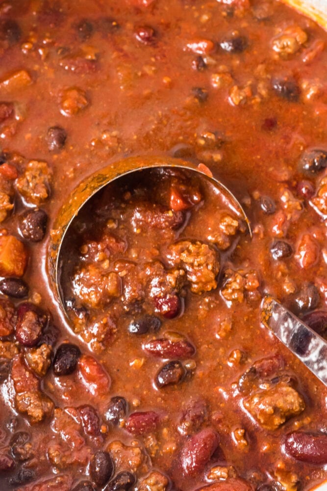 picture of chili in a pot with a ladle in it