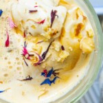 picture of earl grey affogato in a glass mug with corn flowers on top