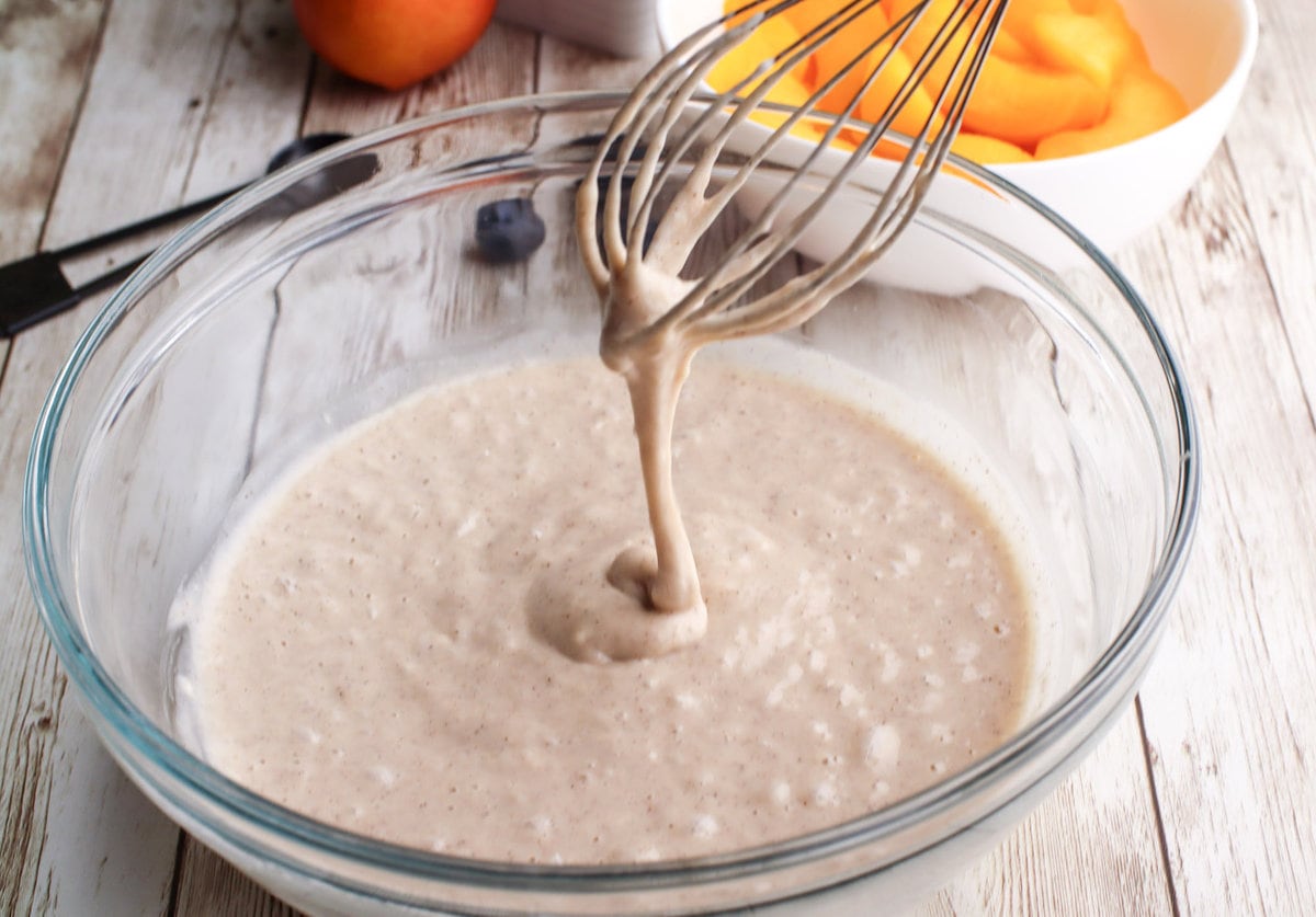 whisk in a bowl stirring batter