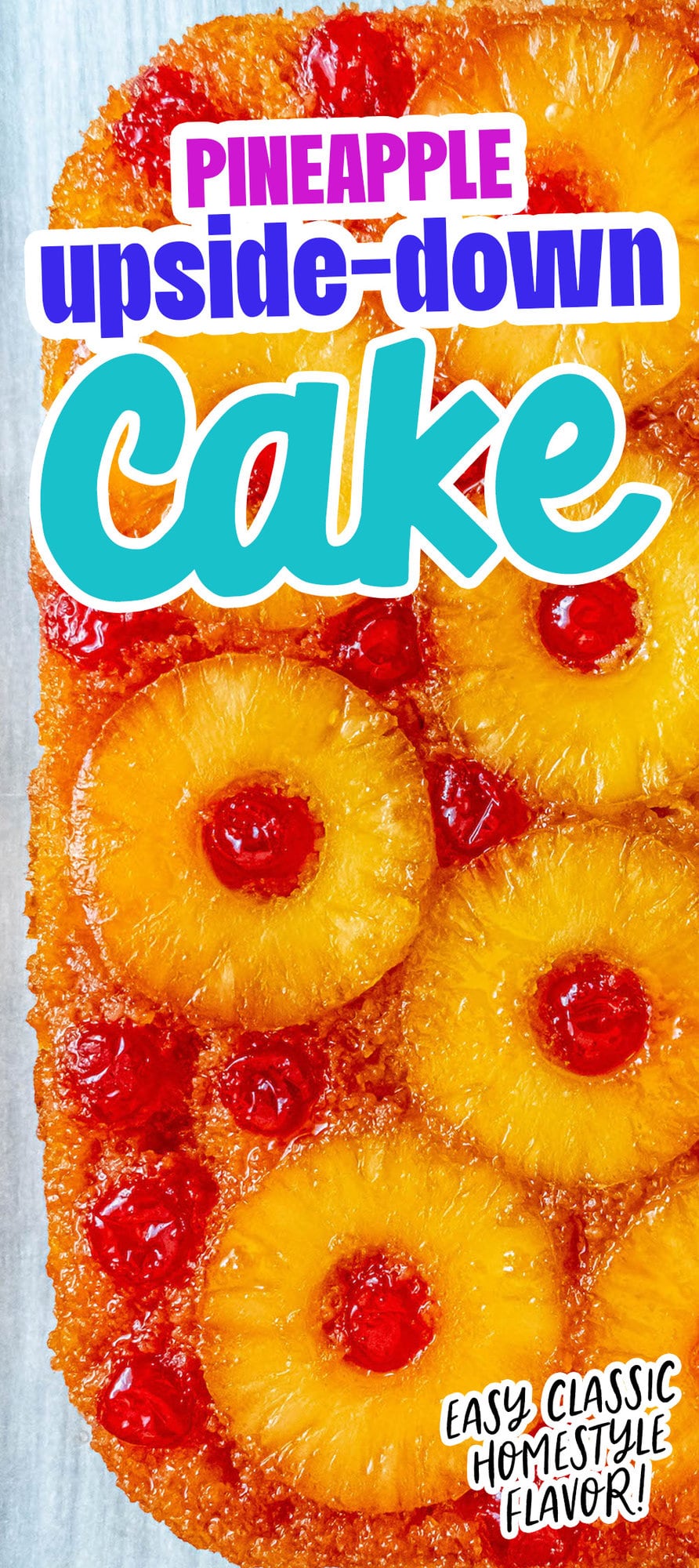 picture of pineapple upside down cake with a pineapple and maraschino cherry baked onto the top