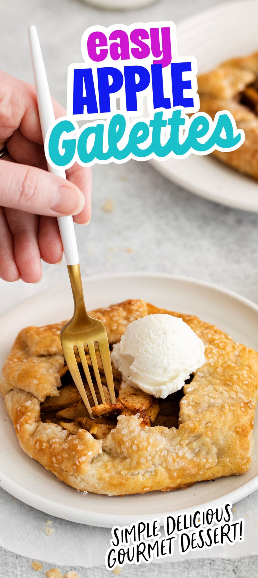 picture of apple galette on a table with a scoop of ice cream and hand holding a fork cutting into it 