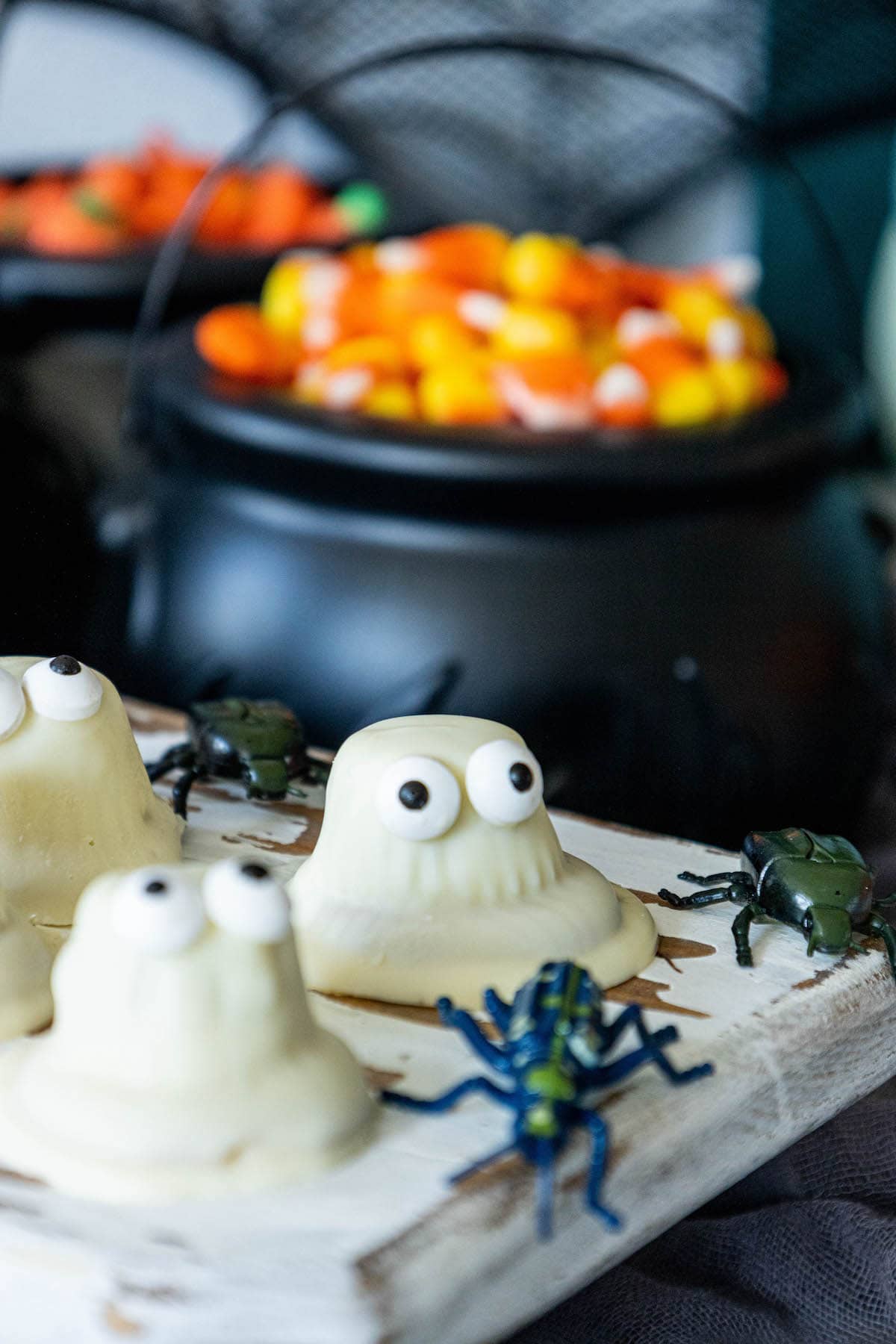 cookies dipped in white chocolate with candy eyes to look like ghosts