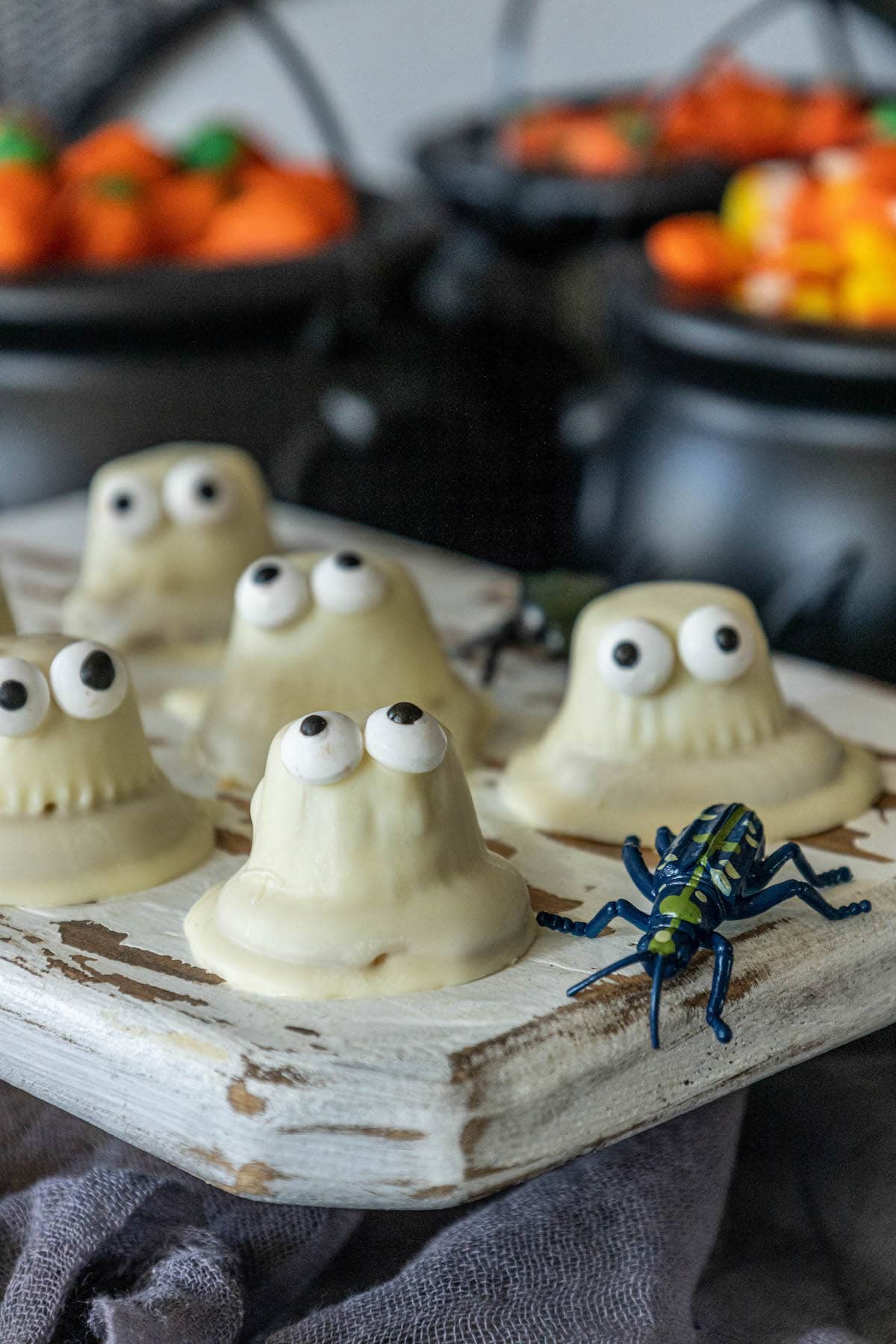 cookies dipped in white chocolate with candy eyes to look like ghosts