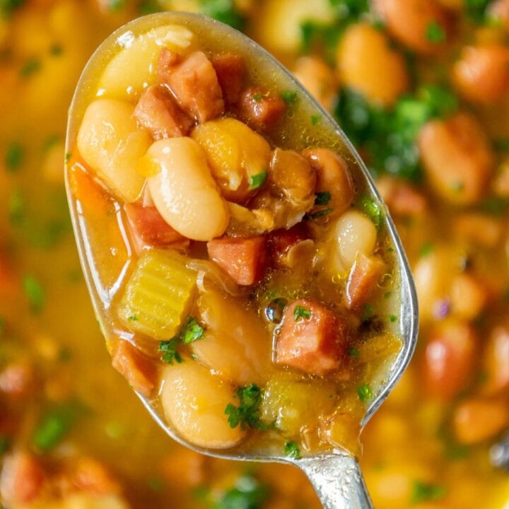 picture of diced ham and bean soup on a spoon