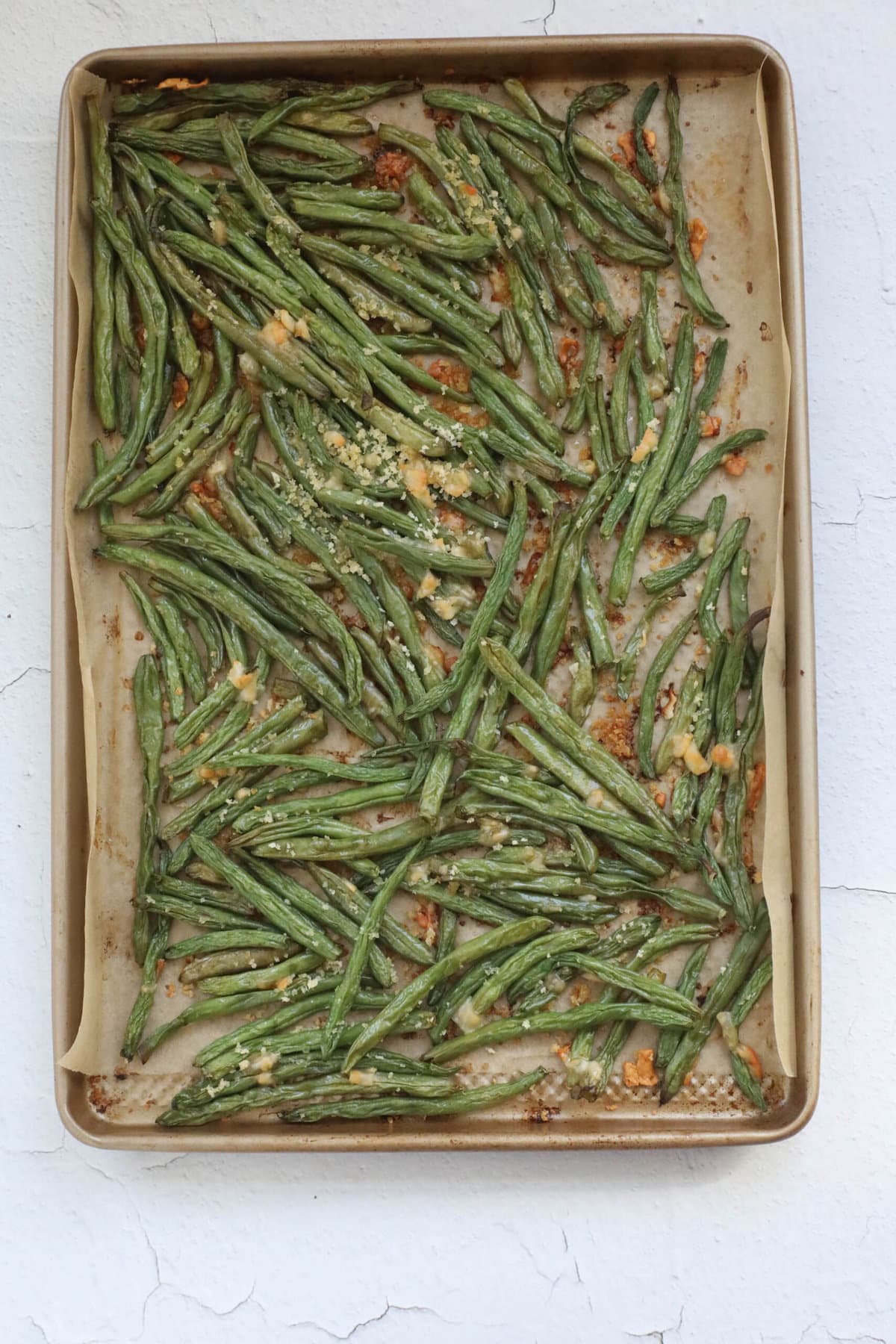 Parmesan Roasted Green Beans on a baking sheet.