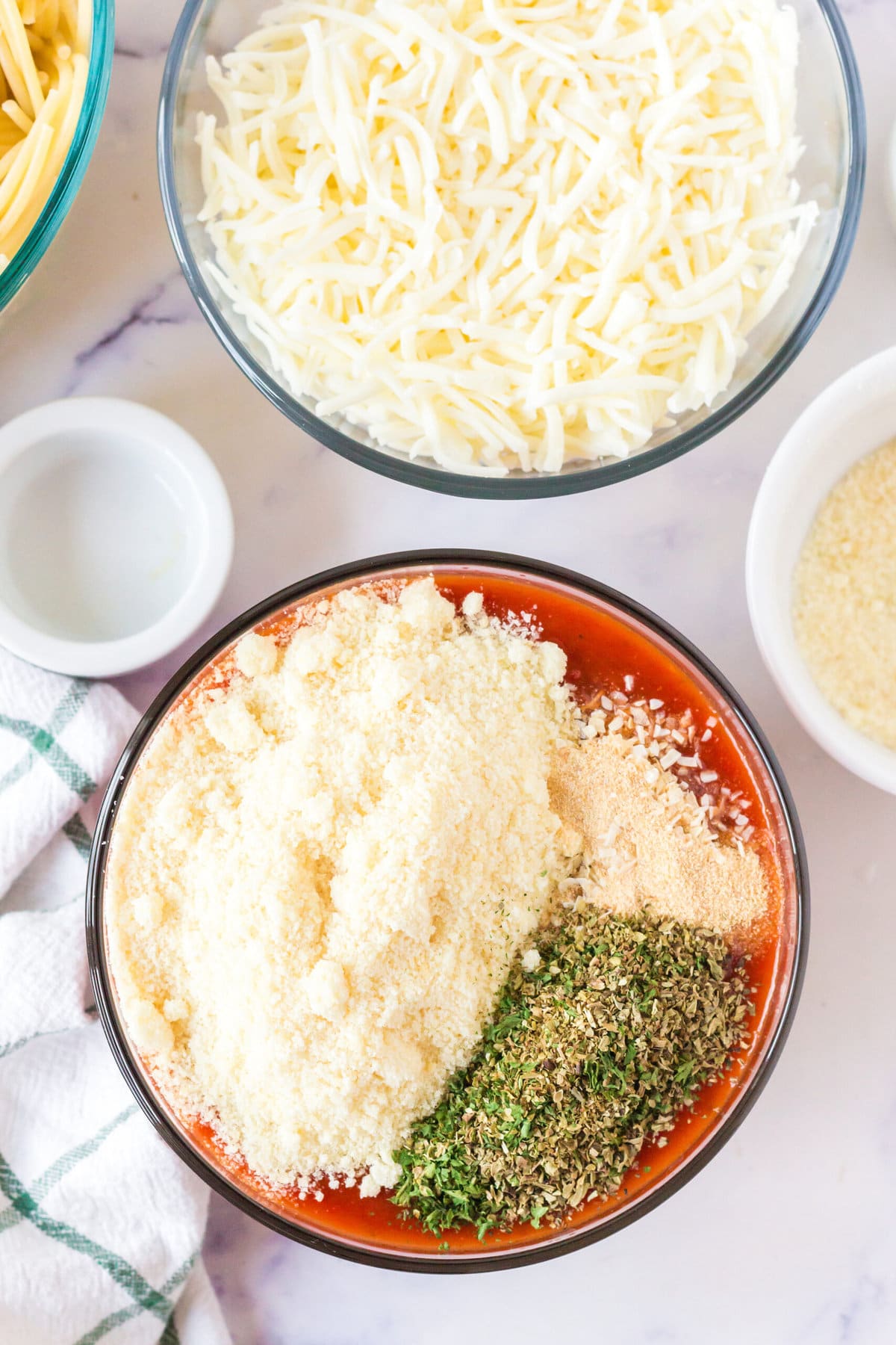 picture of cheese and pasta in a bowl being mixed