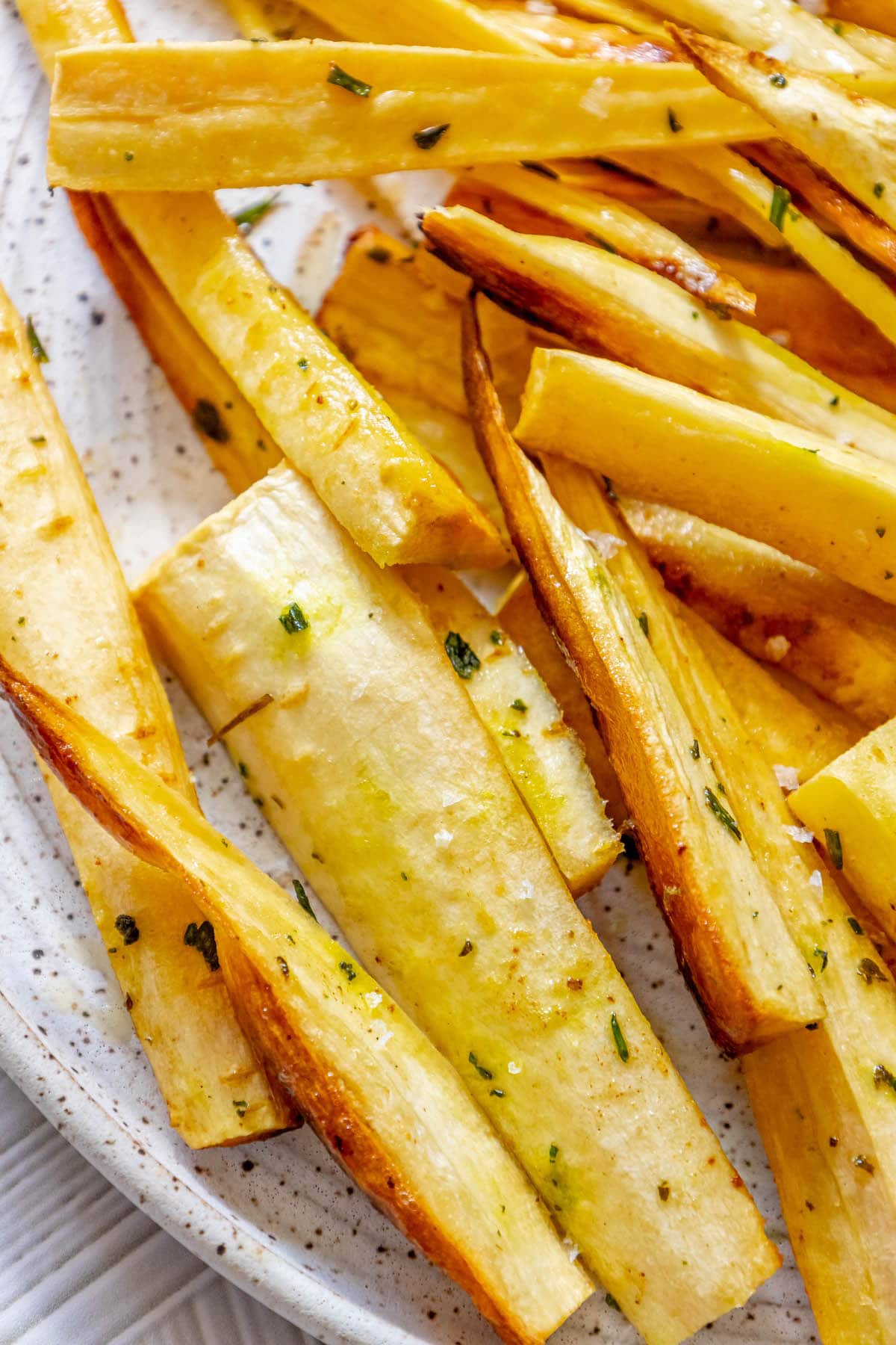 roasted parsnips seasoned with garlic butter and herbs 