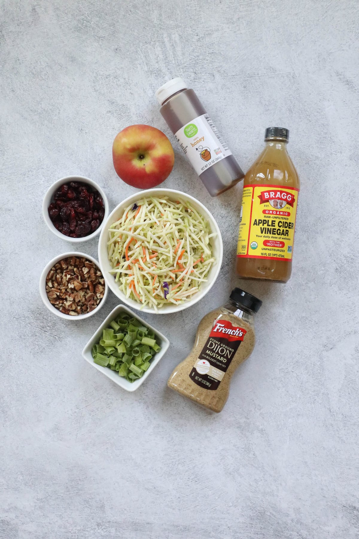 Harvest Cranberry Pecan Salad 4 Picture of cranberry salad ingredients on a table