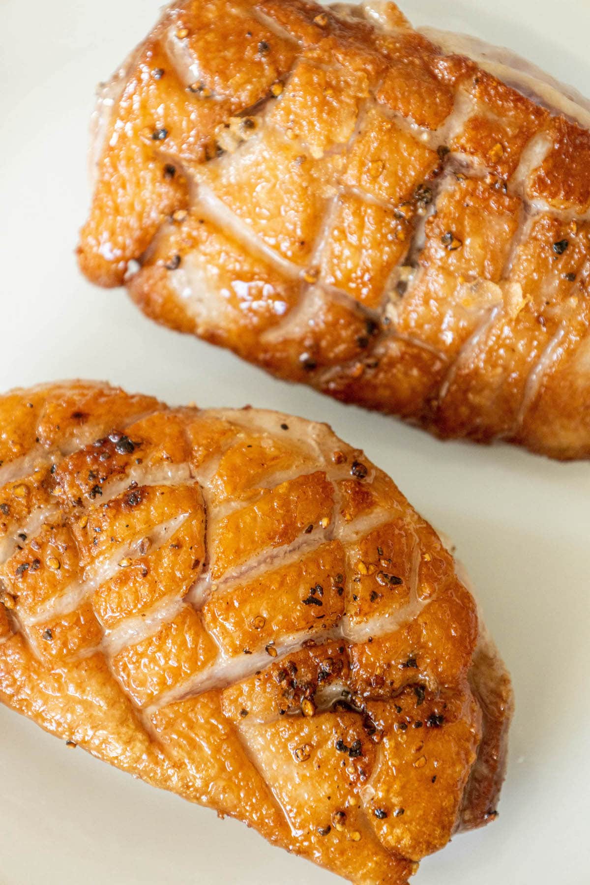 seared duck on a plate