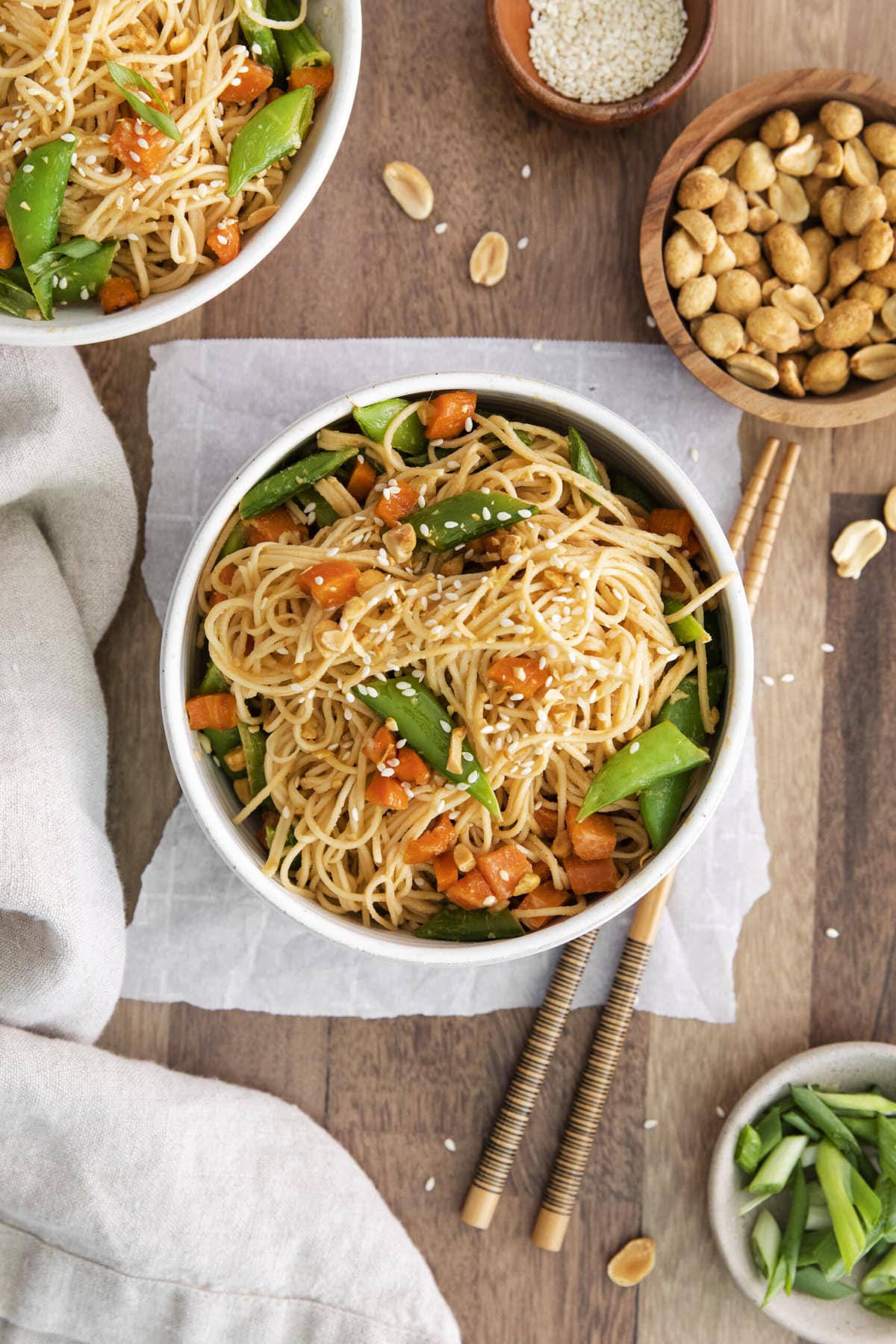 noodles, carrots, peas tossed in peanut sauce.