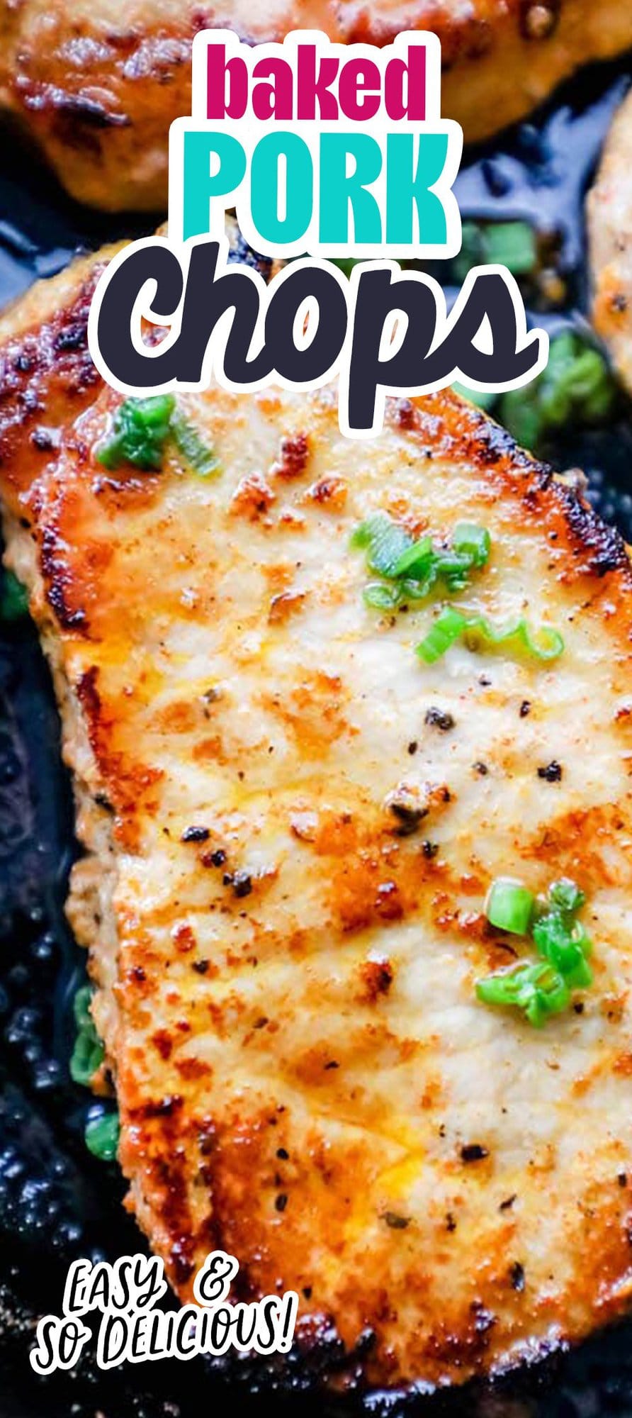 a baked pork chop in a cast iron pan with chives on top