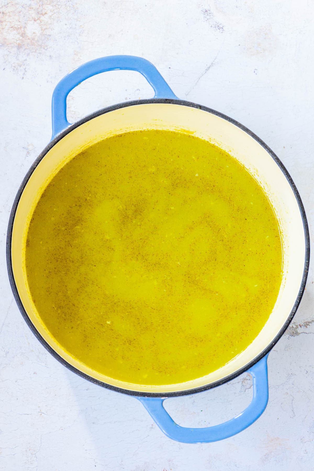 tomatillo stew base in a pot