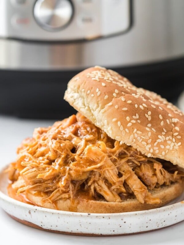 shredded bbq chicken in a bun