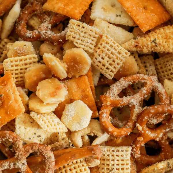 A bowl of Chex mix with pretzels and a savory ranch seasoning.