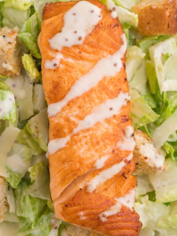 salmon filet over caesar salad