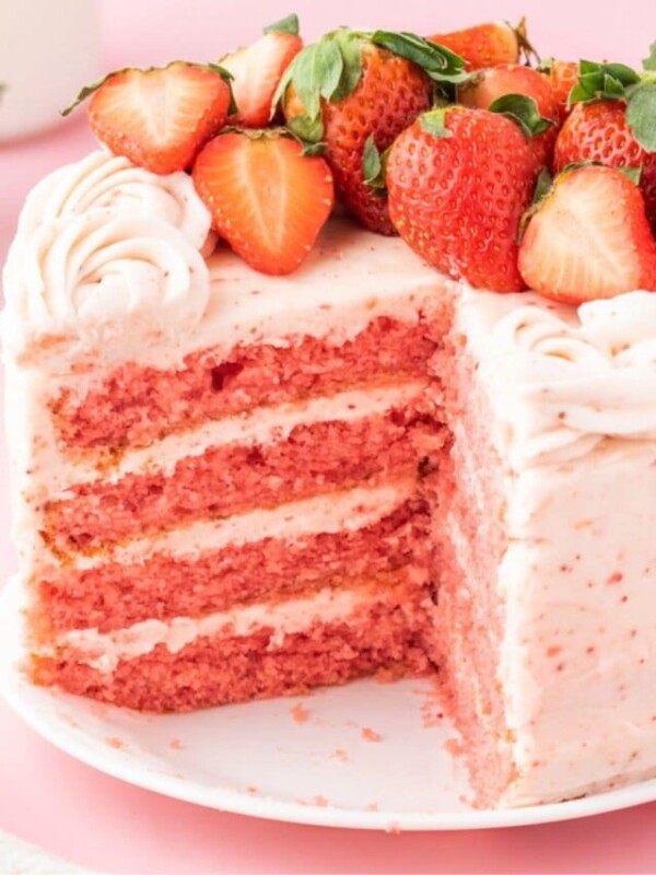 delicious pink cake topped with strawberries