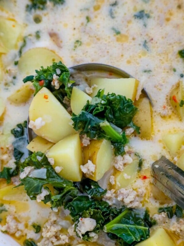 potatoes, kale, and meal in a creamy soup