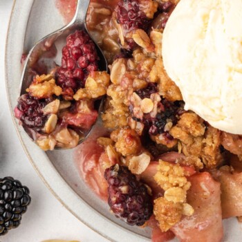 blackberry crumble on a white plate