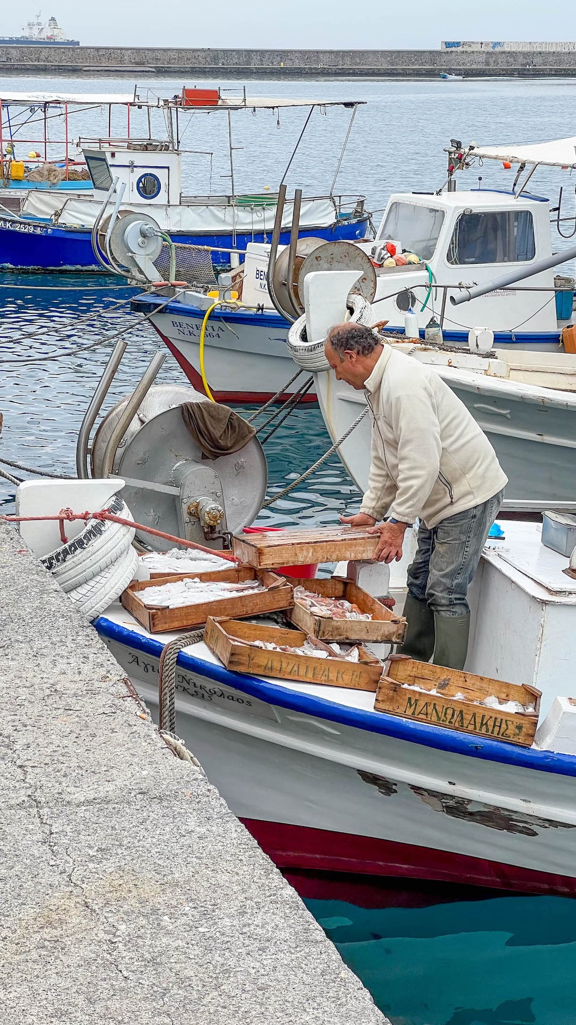 Fresh produce at a Greek market, highlighting the quality of local ingredients.