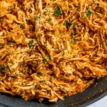 shredded chicken tinga in a pan