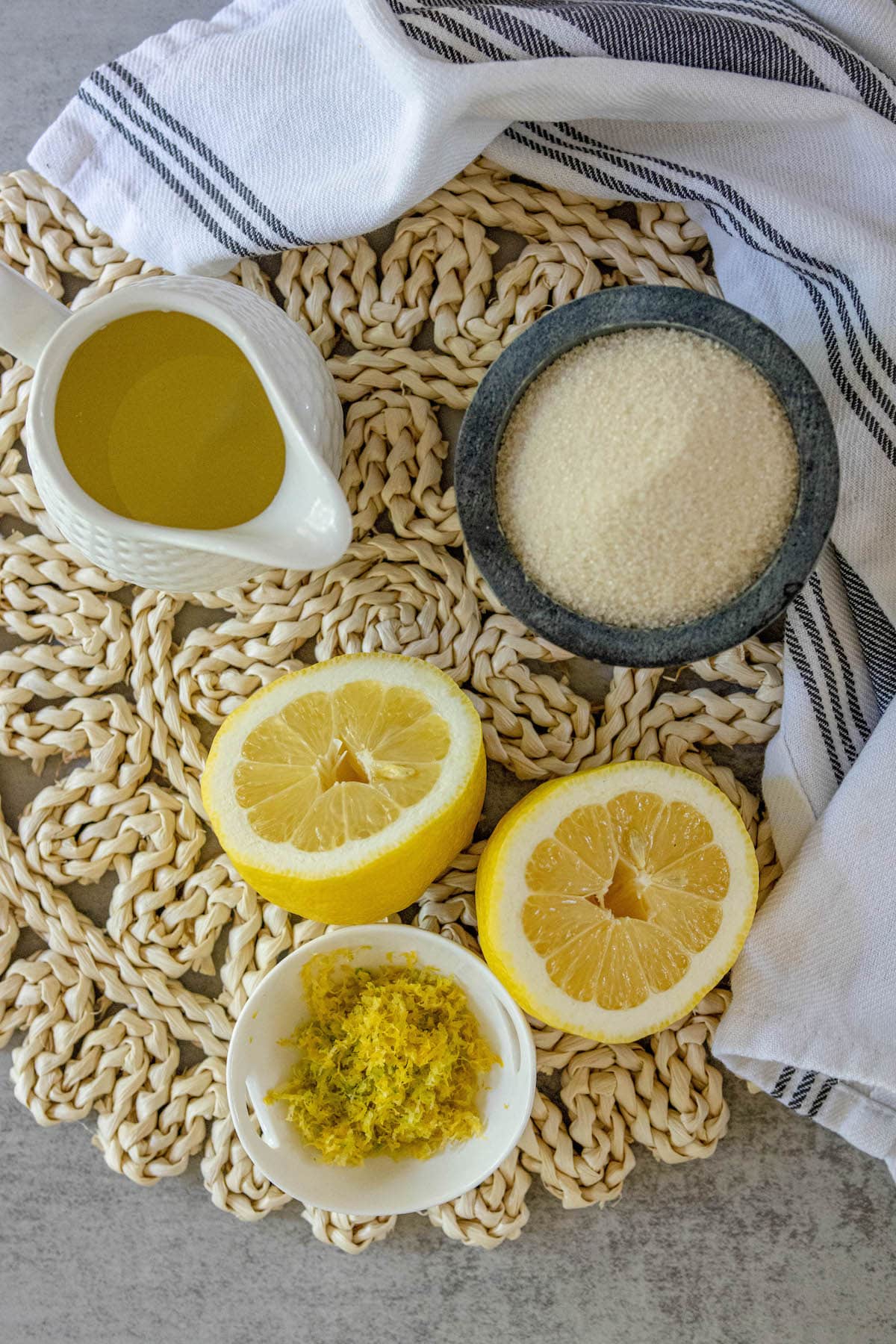 lemons, simple syrup, sugar on a table