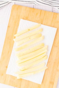 fries drying on a paper towel