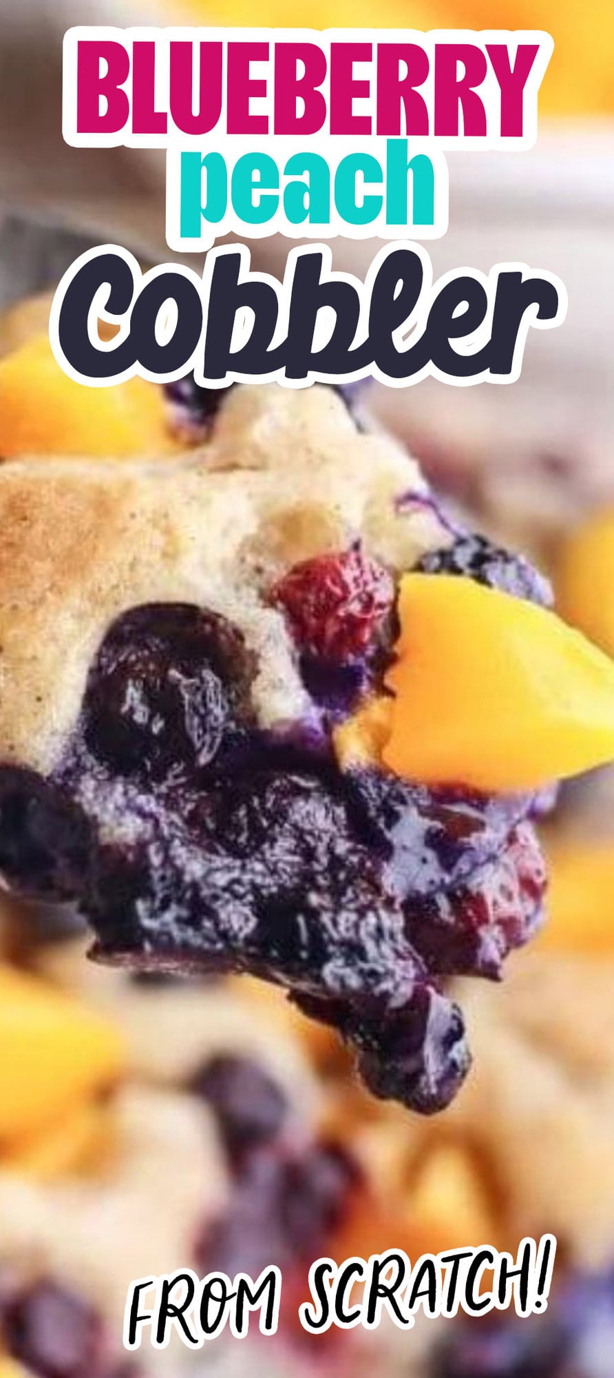 blueberry peach baked cobbler with baked topping on it on a fork