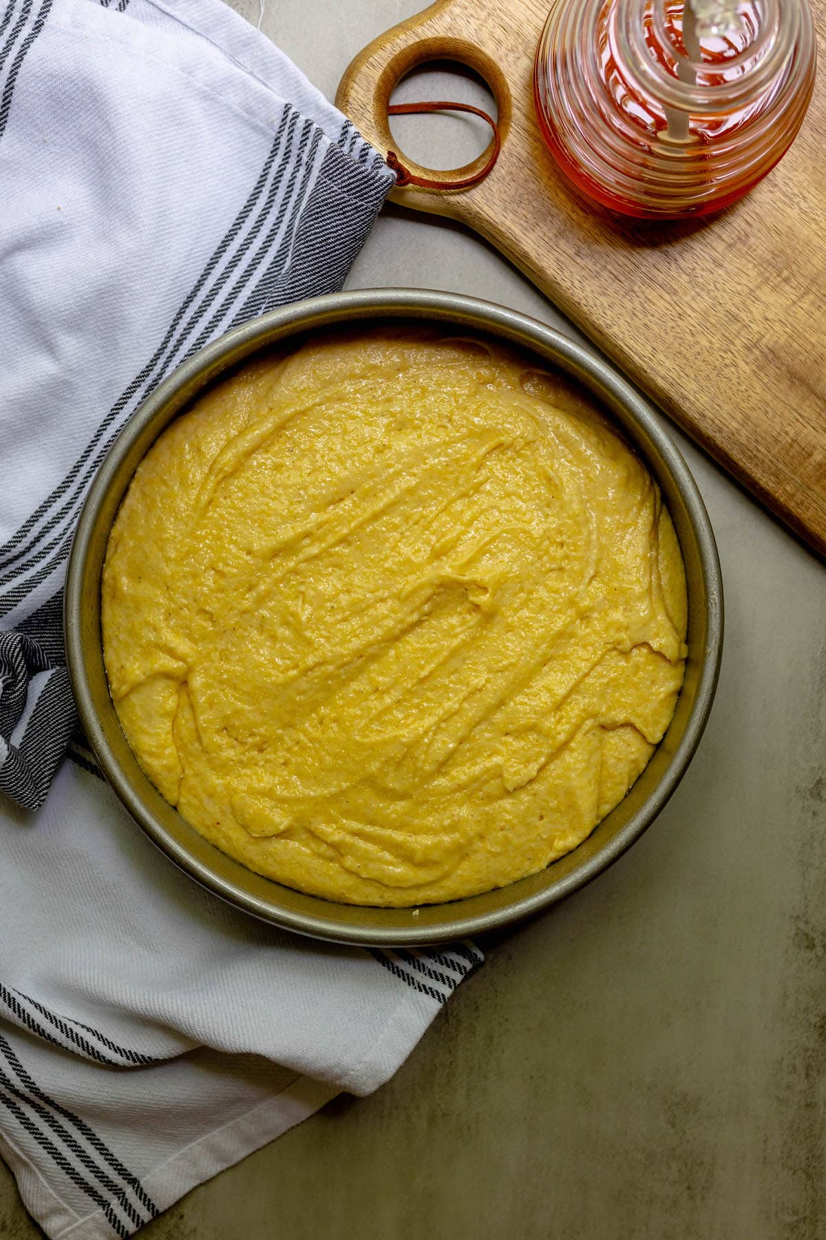 cornbread batter in a greased pan