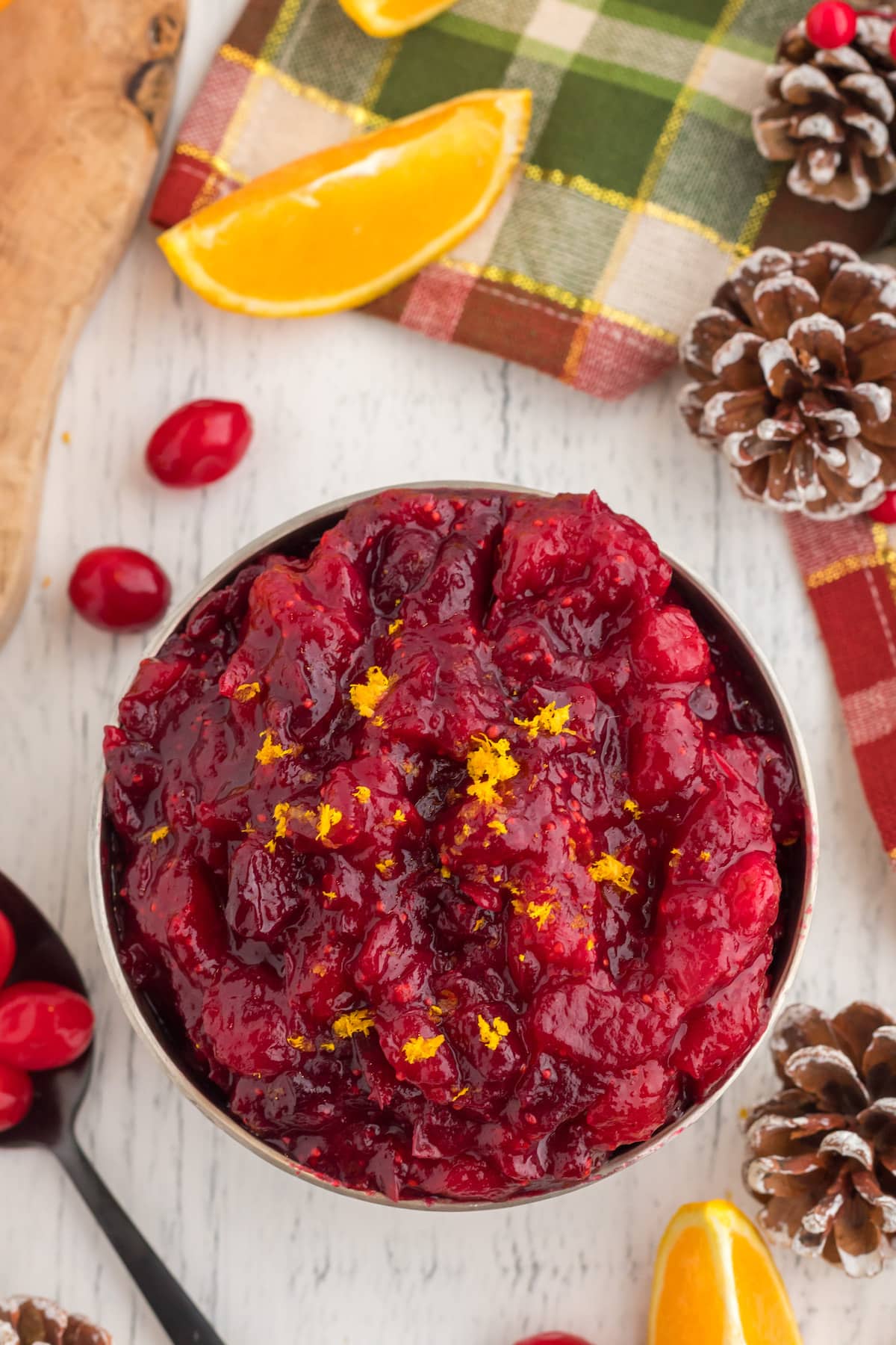 cranberry sauce with orange zest in a bowl on a table