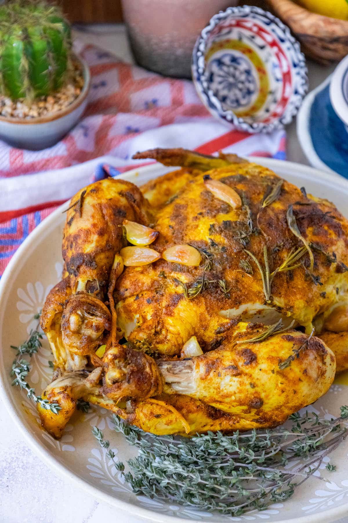 roasted chicken with garlic turmeric on a dish