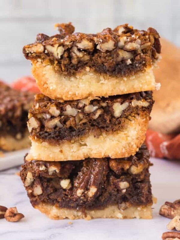 Pecan bars stacked on top of each other.