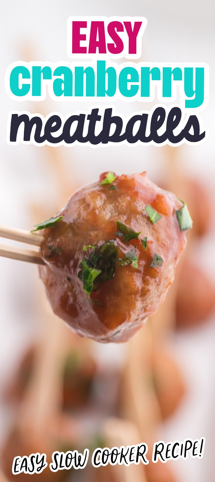 meatballs in a slow cooker in cranberry sauce