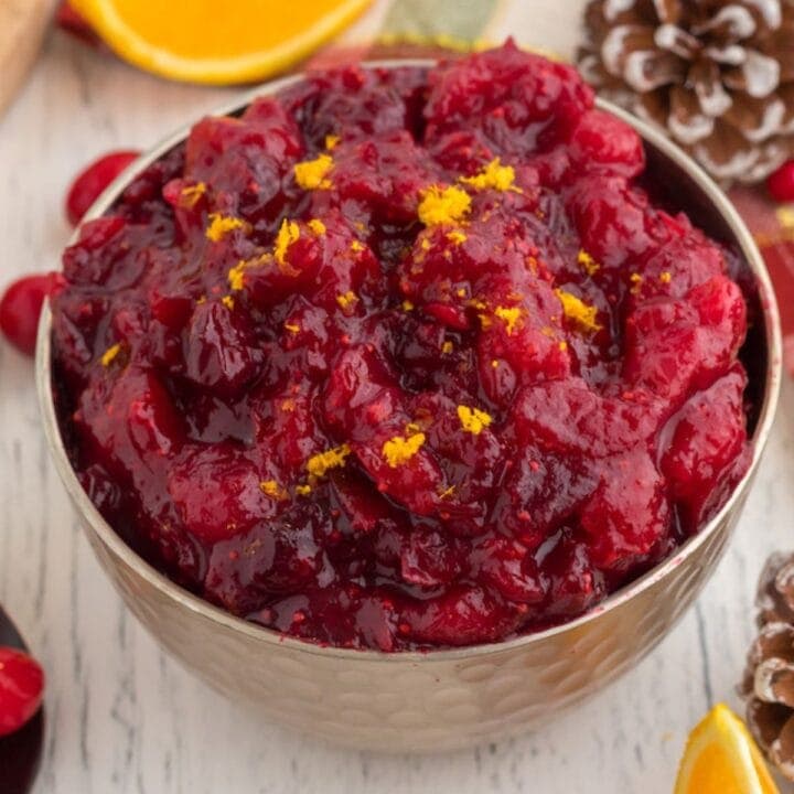 cranberry sauce with orange zest in a bowl on a table
